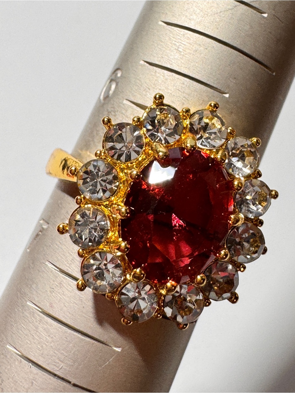 Gold-Plated Women’s Ring with Red Center Stone and Clear Halo